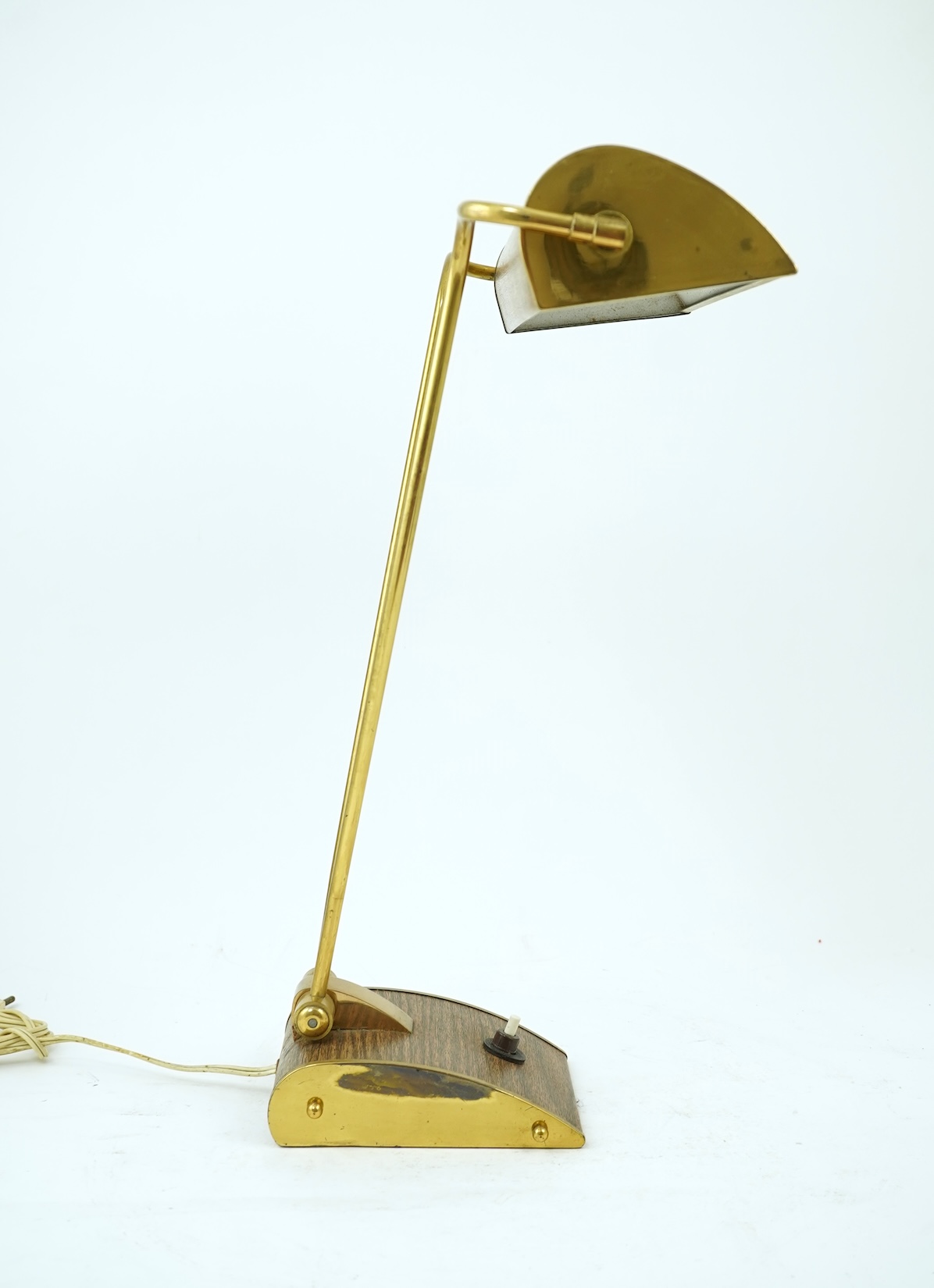 Eileen Gray (Irish, 1878-1976) for Jumo: A brass and wood veneer desk lamp